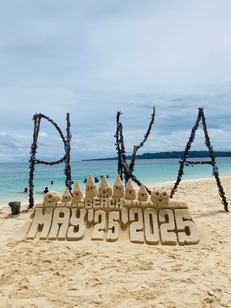 Puka Beach - Puka Sign and Sand Castle with Date